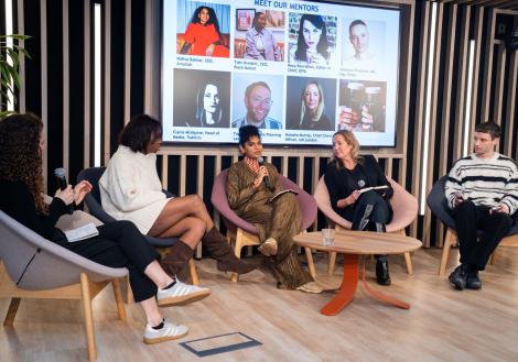 people sitting on stage